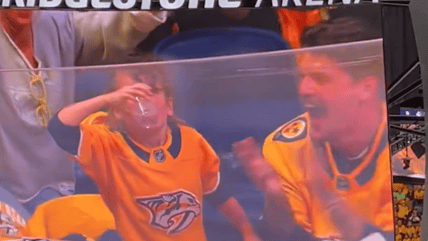 An amazing father-daughter moment as Taylor Lewan chugs his beer in style at a Nashville Predators game, then gets one-upped by his daughter.