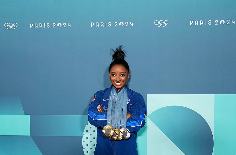 Simone Biles, Caitlin Clark