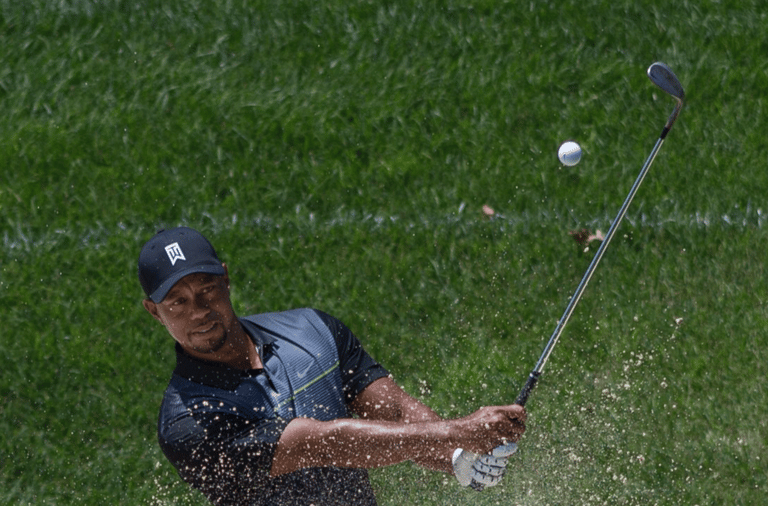 Tiger Woods practices at the Quicken Loans National golf tournament at Congressional Country Club on June 24, 2014 in Bethesda, Maryland.