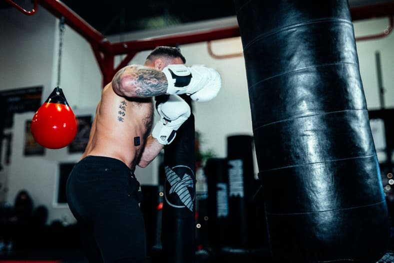 guy hitting punching bag