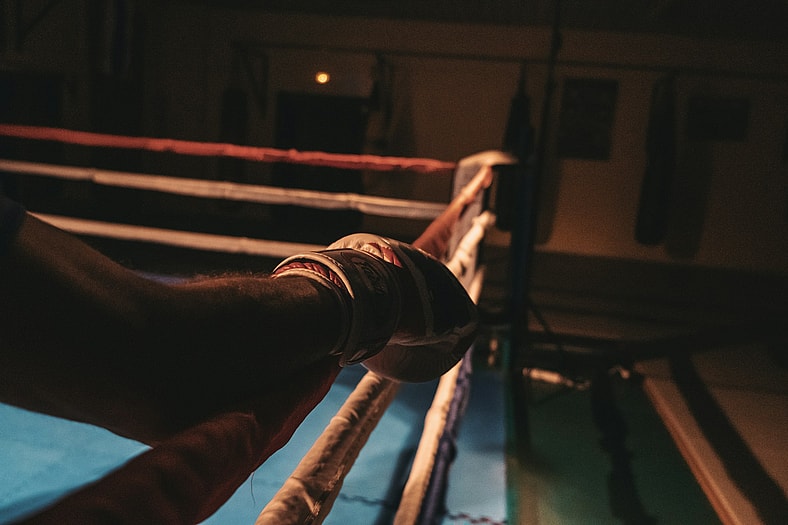 boxer's glove on the ropes