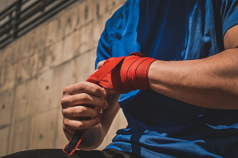 fighter wrapping his hands