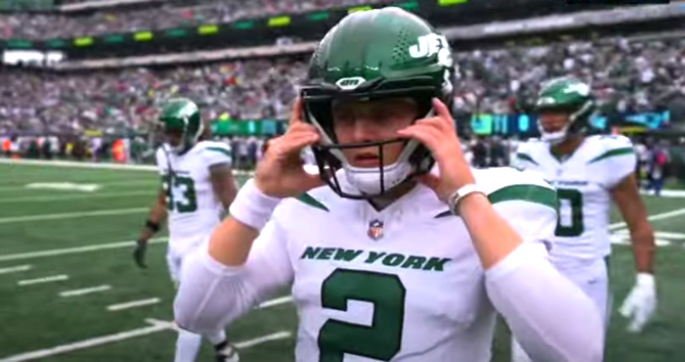 WATCH Jets Fan LOSES His False Teeth While Booing Zach Wilson Off The