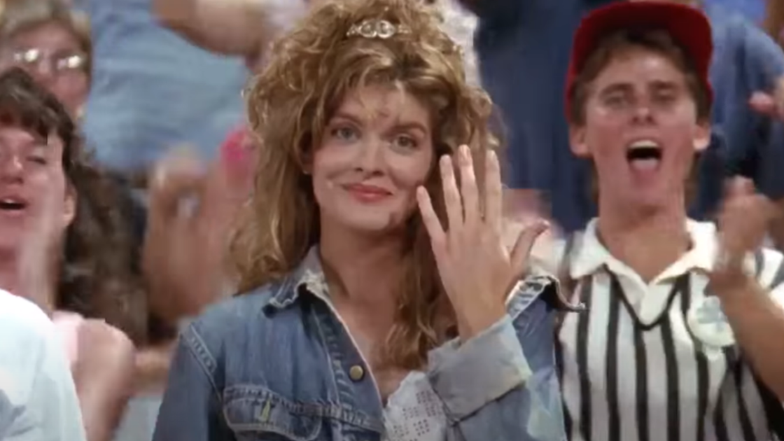Director of the movie 'Major League' says he had to tie Rene Russo's hands down because she moved them so much: 'She's Italian.'