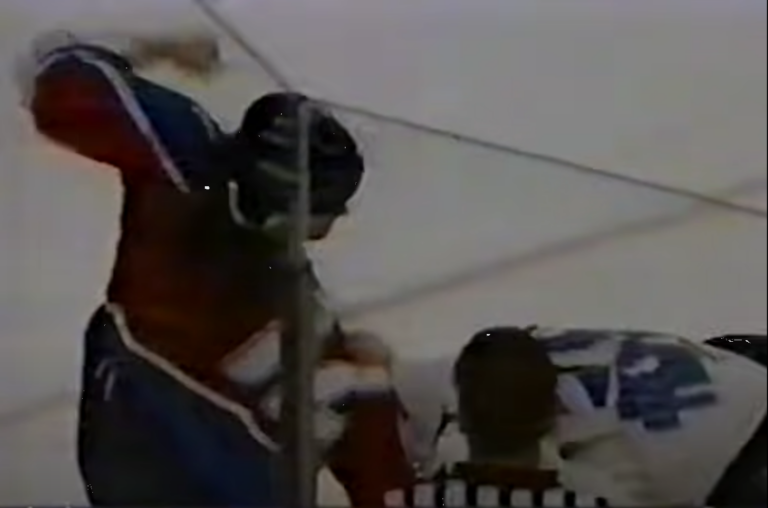 Colorado's Chris Simon Firghts Chicago Blackhawks' Bob Probert in 1996