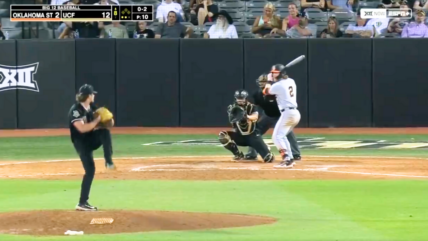 Witness the incredible moment when a UCF pitcher throws a pitch with a rocket launch happening in the background.