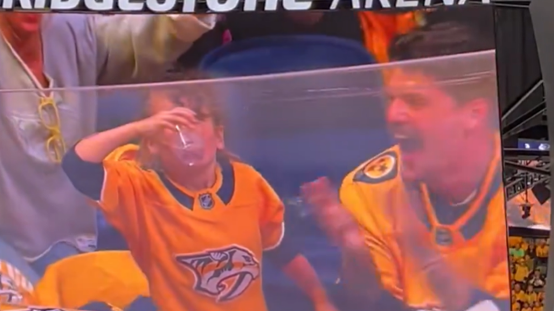 An amazing father-daughter moment as Taylor Lewan chugs his beer in style at a Nashville Predators game, then gets one-upped by his daughter.