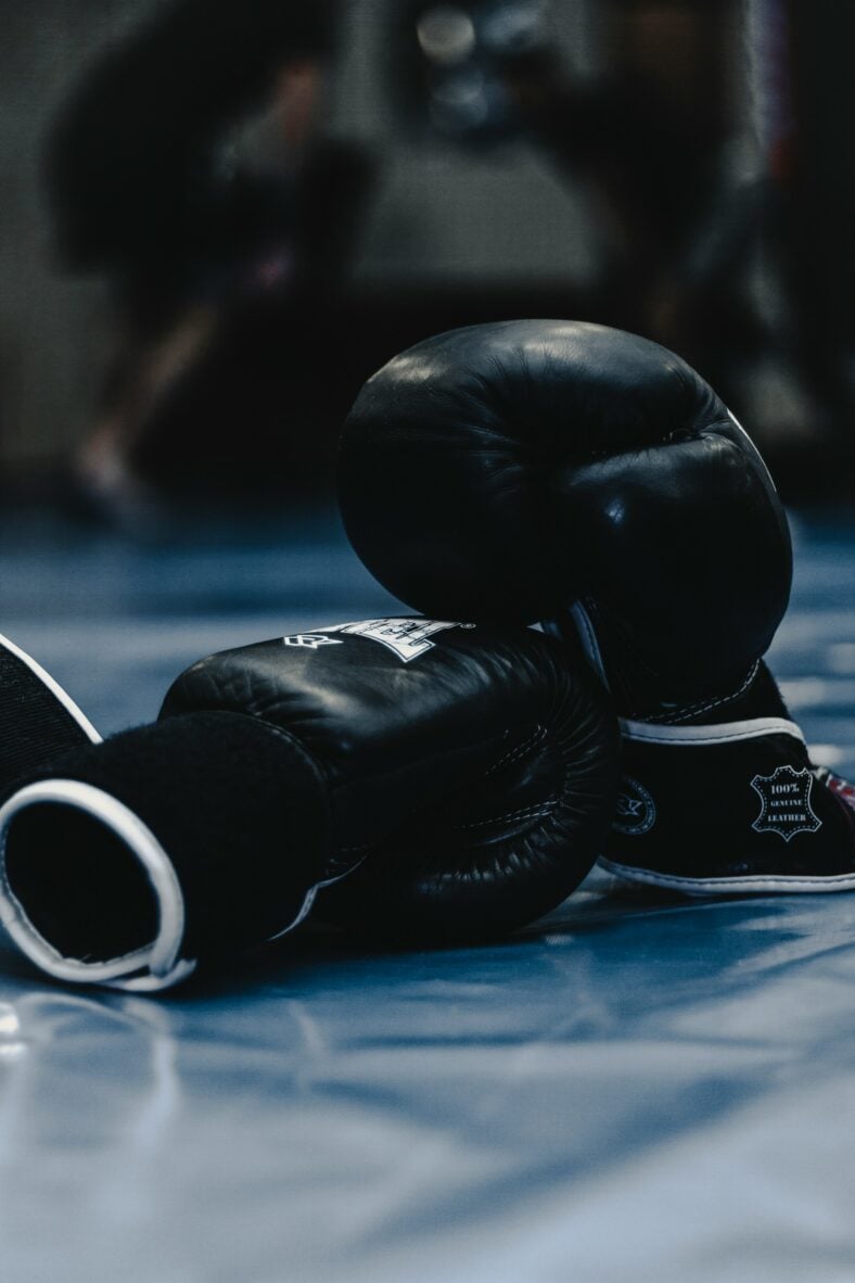 black boxing gloves on floor