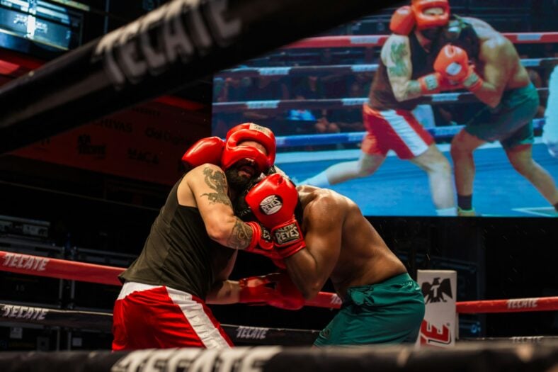 two men boxing in a ring